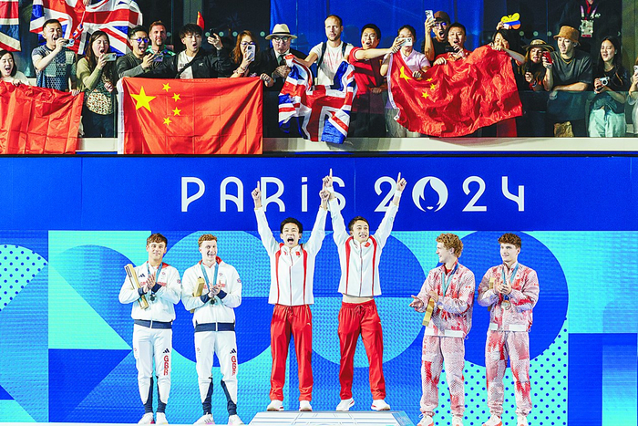 中国选手收获巴黎奥运会跳水男子双人10米台金牌。李昊 摄