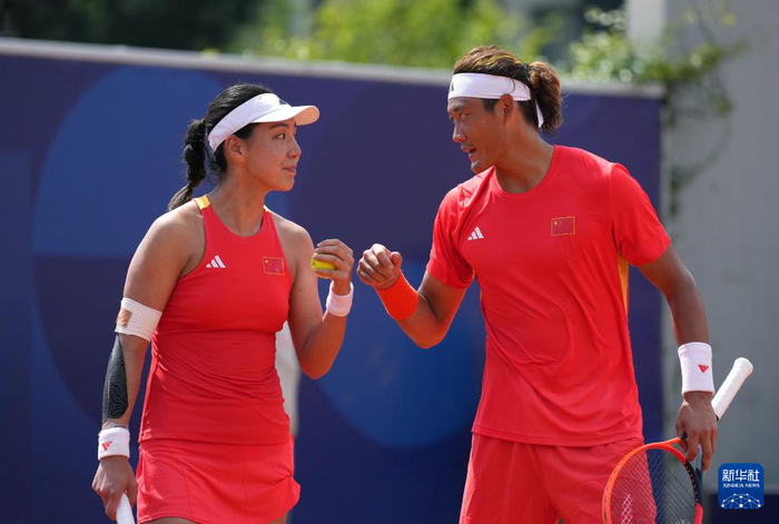 “临时搭子”默契感十足。图源：新华社