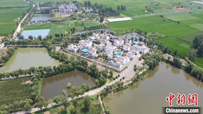 航拍阜南县曹集镇利民村西田坡庄台。中新网记者 韩苏原 摄
