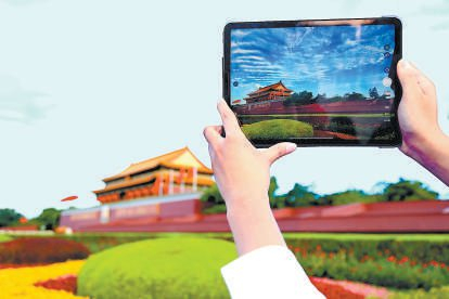 　　定格记忆　　每个来到天安门的人都会用照片定格专属记忆。周建林 摄