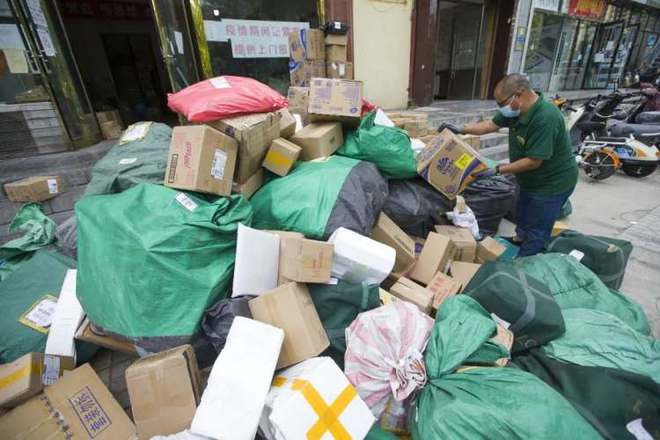 关于“仅退款”的争议，物流成本是其中很重要的因素。（图/视觉中国）