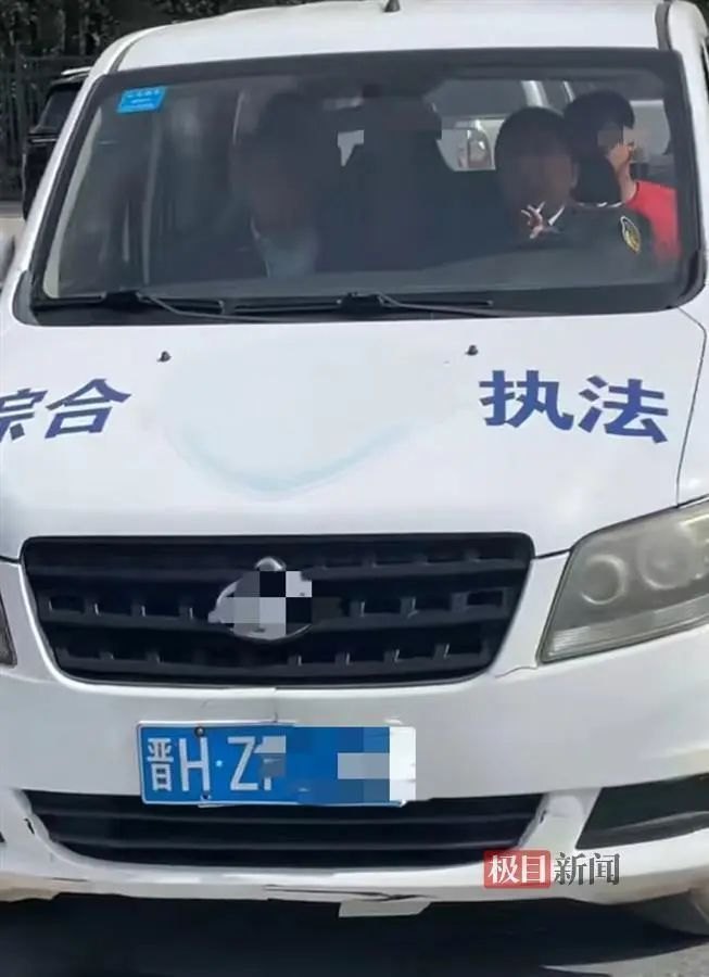 司机系执法队员（视频截图）