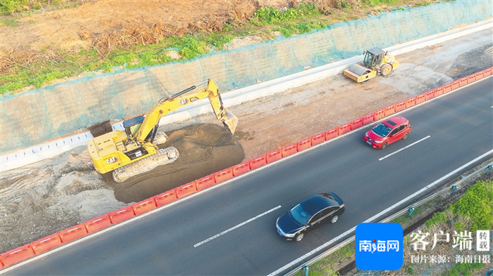 近日，在定安县定城镇的G98环岛高速公路仙沟互通立交改造项目施工现场，一派忙碌景象。海南日报全媒体记者 袁琛 摄