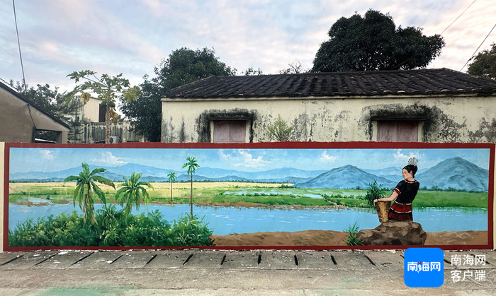 青年画家们在昌江叉河镇创作的墙绘作品。省青年美协供图