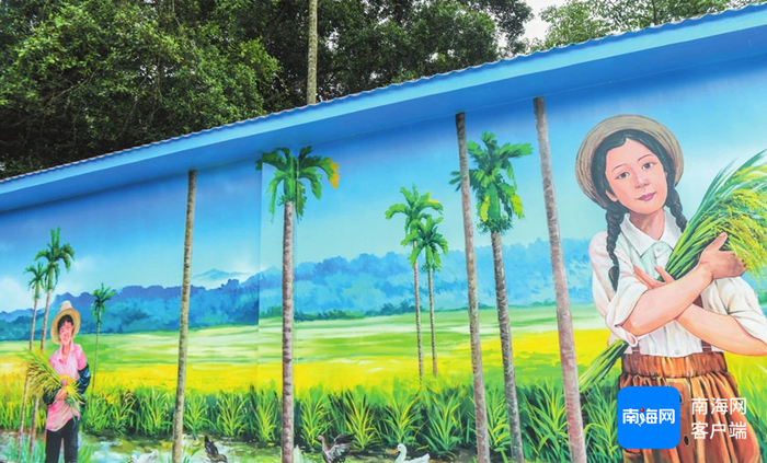 青年画家们在海口市美兰区演丰镇演南村创作的墙绘作品。省青年美协供图
