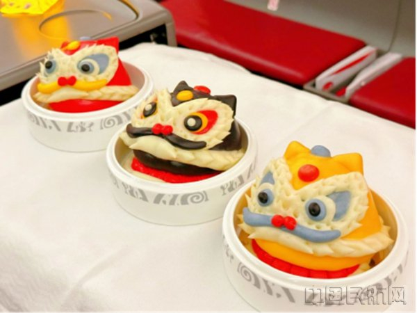 海南航空在海口—北京航线公务舱推出非遗国潮醒狮面点（本文图片均由海航提供）