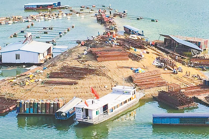 三省（区）联合开展拆除网箱整治行动。