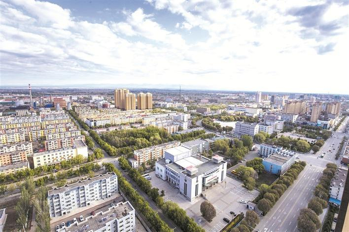 航拍九师白杨市朝阳新区一角（资料图片）。九师白杨市党委宣传部提供