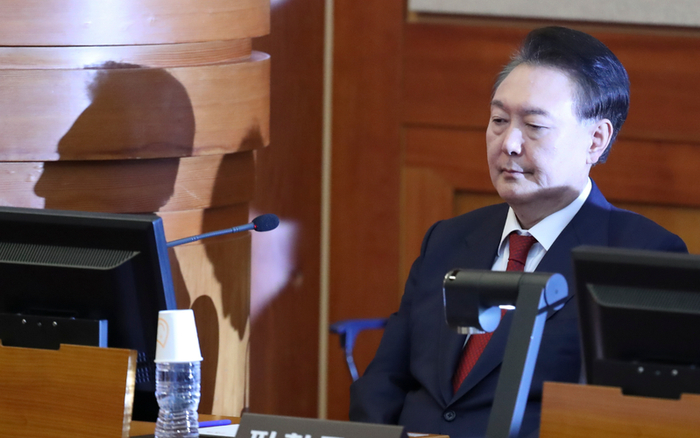 ▲资料图：2月20日，尹锡悦出席总统弹劾案庭审。图/新华社