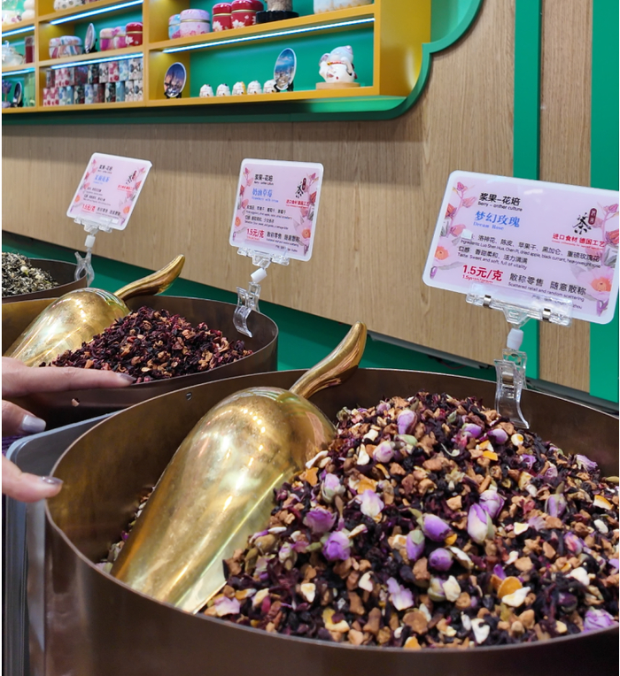 某品牌花茶价格为1.5元每克