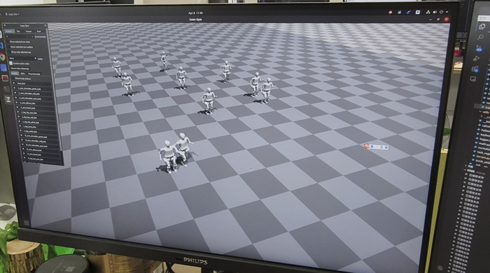 松延动力工程师在仿真环境中训练模型周悦/摄