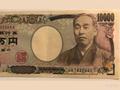 美联储降息预期压制美元，日元受日本央行鹰派信号提振，美元兑日元冲高回落