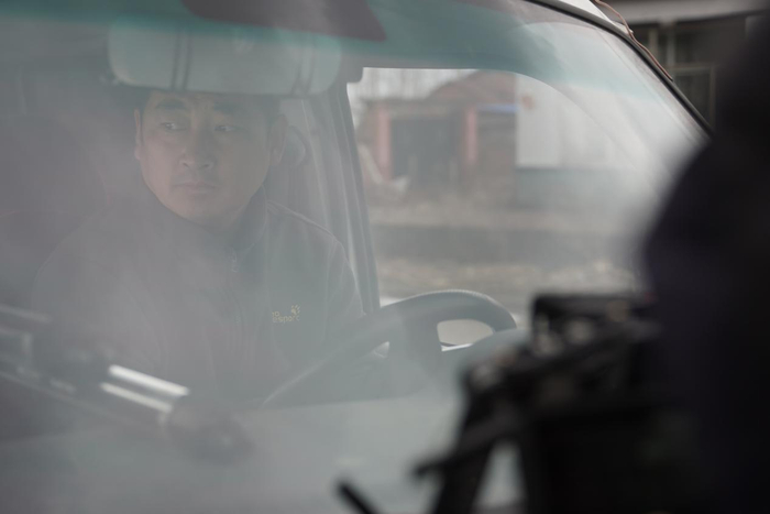 茹长有总是在车上若有所思  胡弘彪/摄