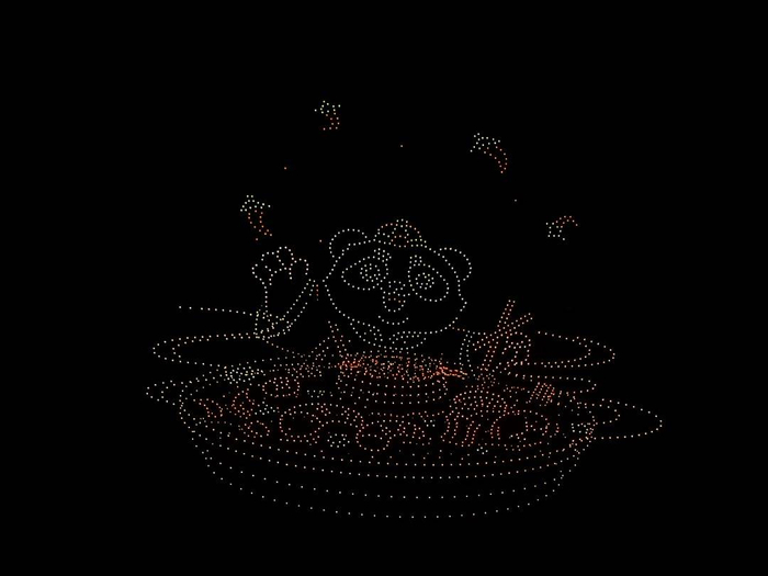 无人机阵列组成的熊猫吃火锅图案
