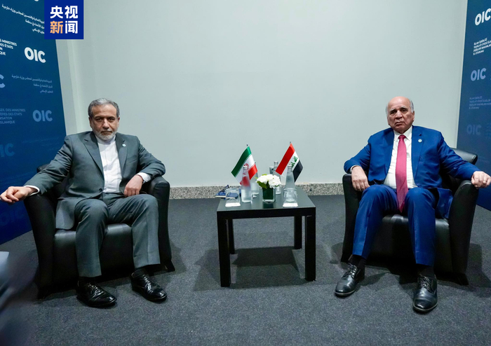 △伊朗外交部长阿拉格齐（左）与伊拉克副总理兼外交部长侯赛因（右）