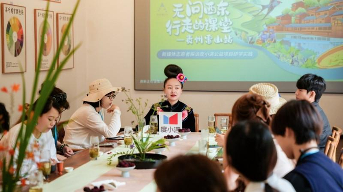 图为小满助力计划用户余鲜为新媒体志愿者现场分享