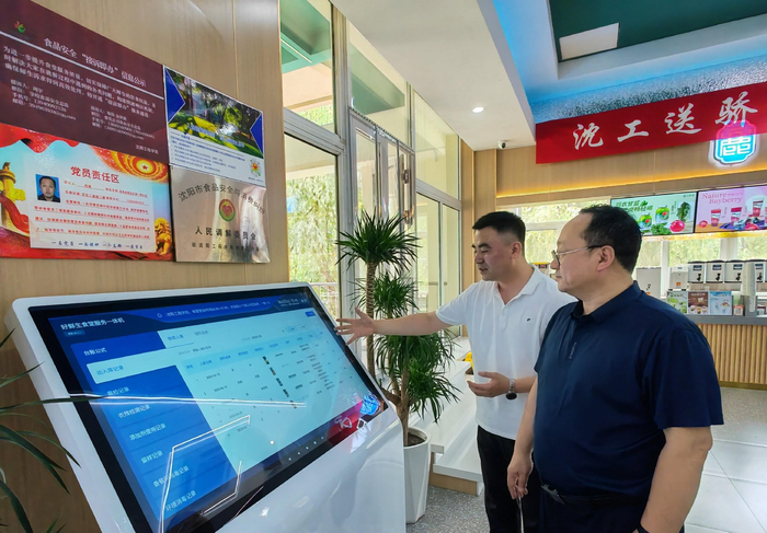 食材可追溯体系普及应用。王文郁/摄