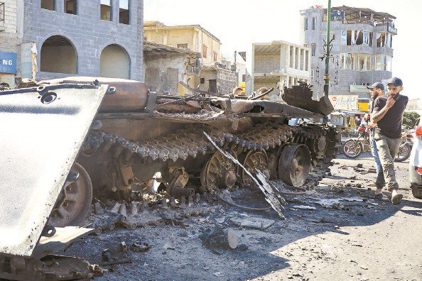             苏韦达省街头的军用车辆残骸  图IC          