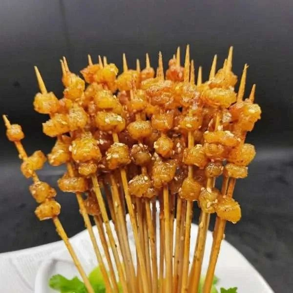 烤牛油。 图/岳阳市烧烤协会