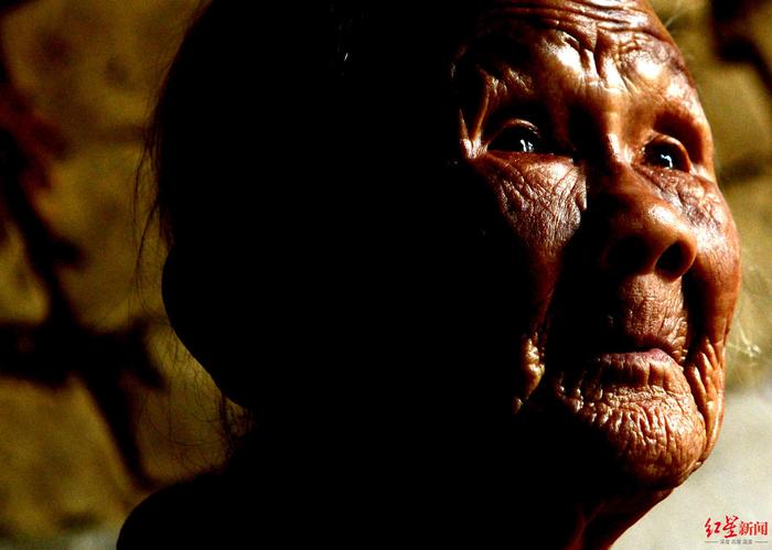 ▲“慰安妇”制度受害幸存者韦绍兰(广西瑶族,1921—2019年) 郭一江 摄