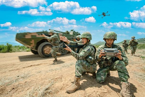 　　“平型关大战突击连”正在组织协同训练。戴胜丰/摄