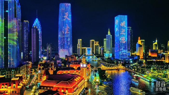 △天津海河上合峰会主题灯光秀。(视觉中国)
