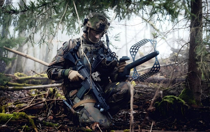 先进卫星对武装力量信息化建设的作用十分重要 图为手持信息化设备的德国国防军士兵