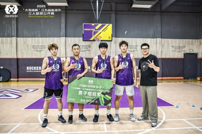 A close-up of 3x3 basketball players competing intensely.