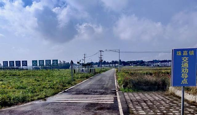 （小路“变”大路 心系民生助发展 王建明摄）