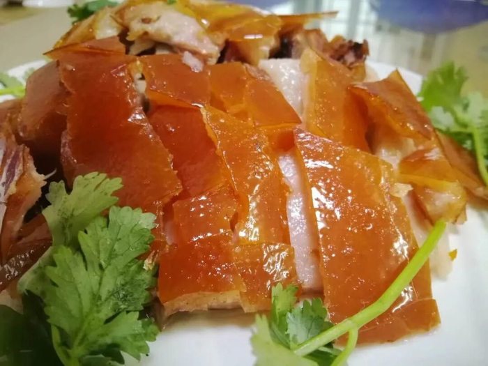 麻章烧猪皮脆肉滑。陈明维 摄
