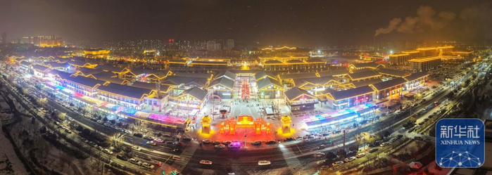 ↑ 1月1日在甘肃省武威市拍摄的正在举行凉州灯会的河西都会景区（无人机照片）。新华社发（姜爱平 摄）
