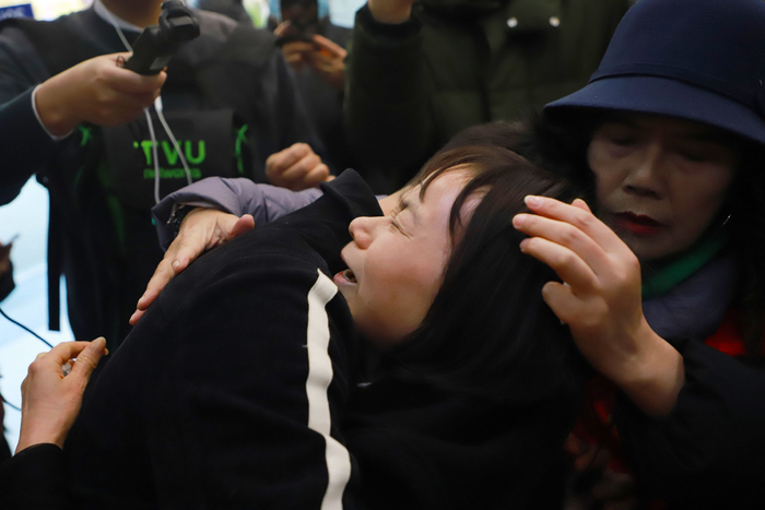 1月10日上午，在湖口縣公安局，這場跨越了三十六載的團(tuán)圓溫情上演。沈海斌 攝