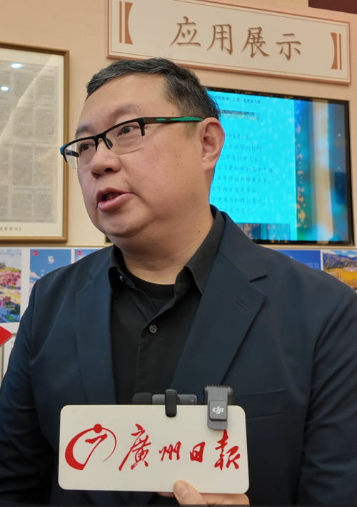 广州日报对方正字库设计总监汪文进行采访