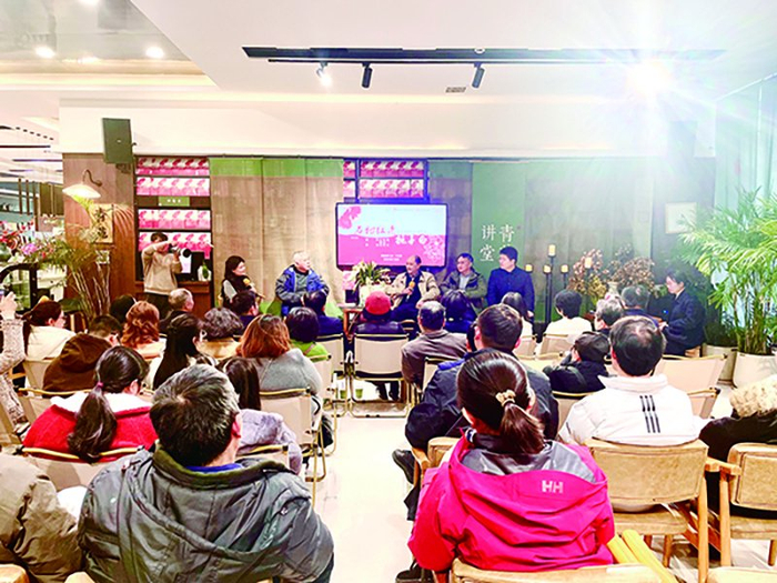 ▲“石榴红来栀子白——周文文学作品分享会”现场座无虚席。