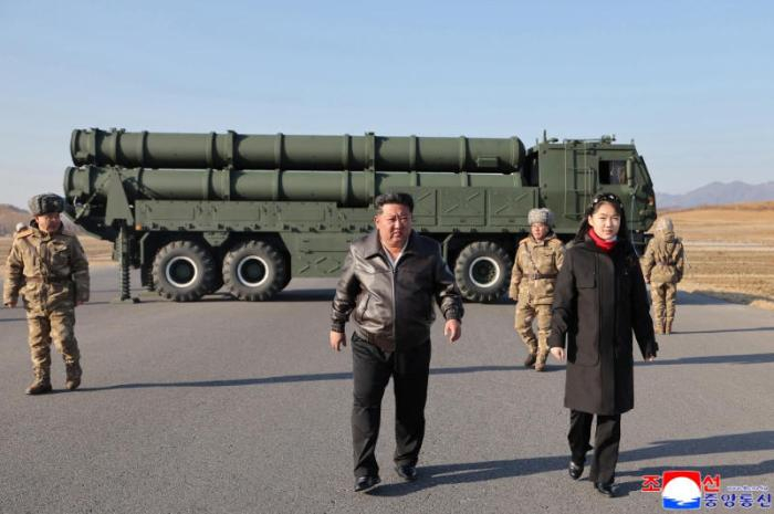 图片来源：朝中社报道截图