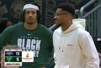 交易漩涡的中心！字母哥一身便装场边看球 神情轻松