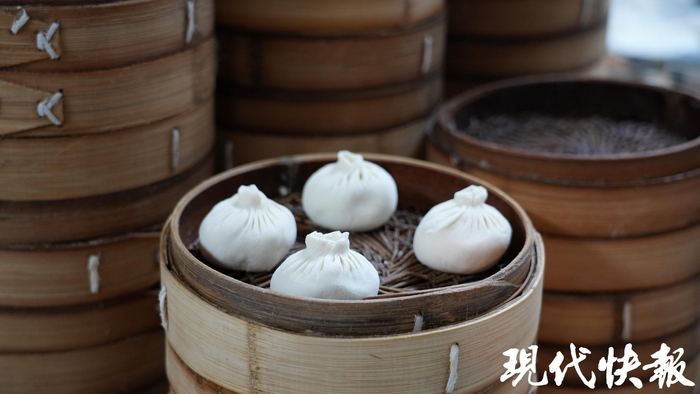 每个包子重量正负误差不能超过2克