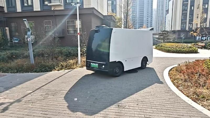 图1：灵小驹自行进入社区驿站