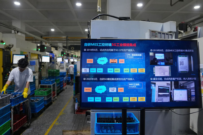     3月27日拍摄的爱柯迪股份有限公司生产汽车铝合金精密压铸件的5G数字化车间。   