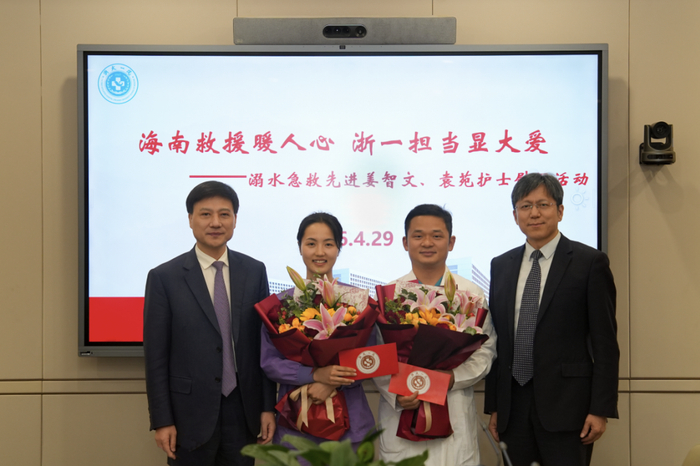 ▲姜智文和袁苑接受医院的慰问。受访者供图