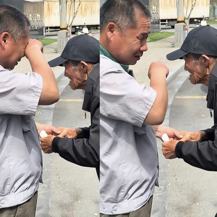 闫长江和张中义老人见面时，泪水决堤。受访者供图
