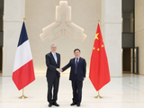 中国人民银行行长潘功胜会见法国央行行长德加洛
