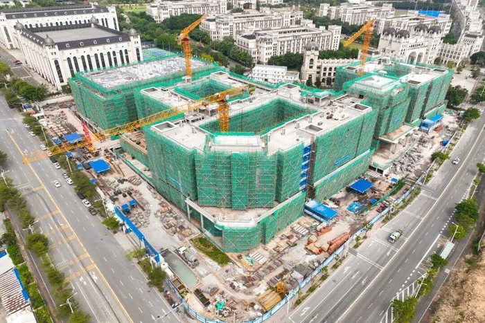 △广东工商职业技术大学国际学术交流中心、音乐厅建设项目主体结构全面封顶。（资料图）