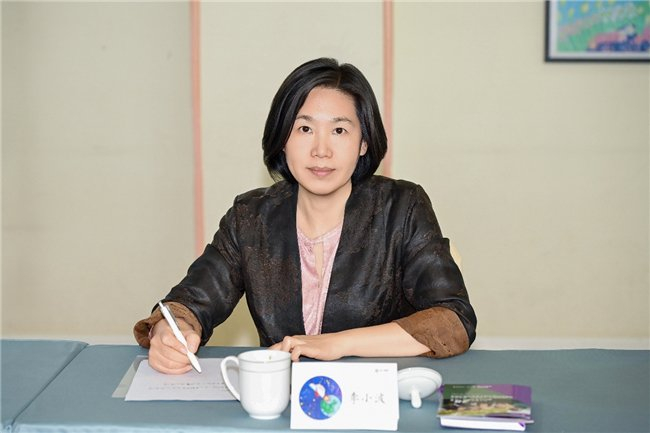 图：民进中央妇女儿童委员会副主任、北京市鑫诺律师事务所管委会副主任李小波