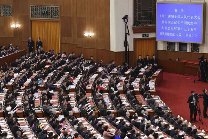 △ 2026年3月12日，第十四届全国人民代表大会第四次会议在北京人民大会堂举行闭幕会。新华社记者 金立旺 摄