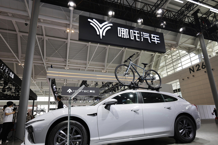 ▲车展上的哪吒汽车（资料图） 据视觉中国
