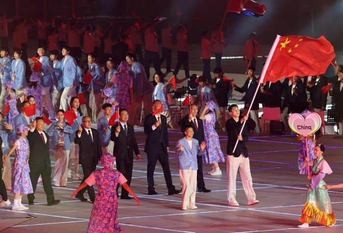   9月19日，中国体育代表团在开幕式上入场。新华社记者 姚琪琳 摄