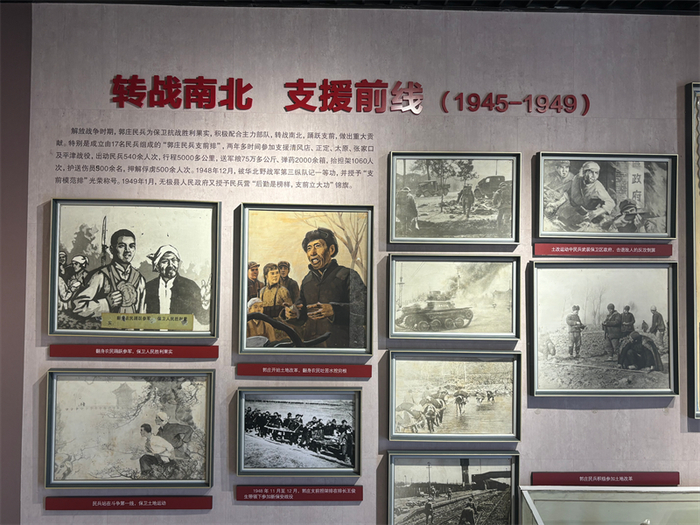 红旗民兵营展室内的老照片、图画等。 张文进 摄