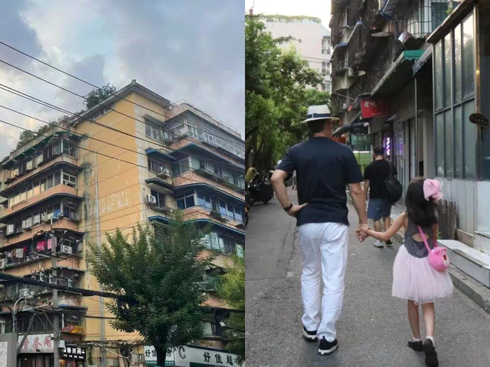 2025年，麦家牵着小女儿走在曾经住过的小区附近