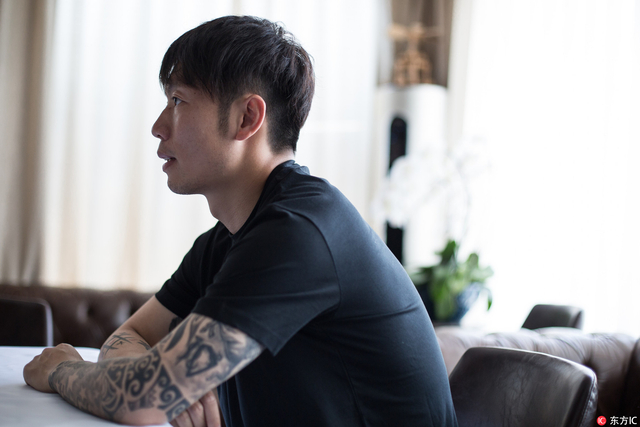 张稀哲写真清秀脸庞与霸气纹身